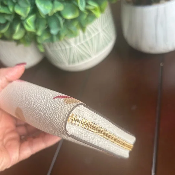 Coach Floral Wallet and Wristlet Set.